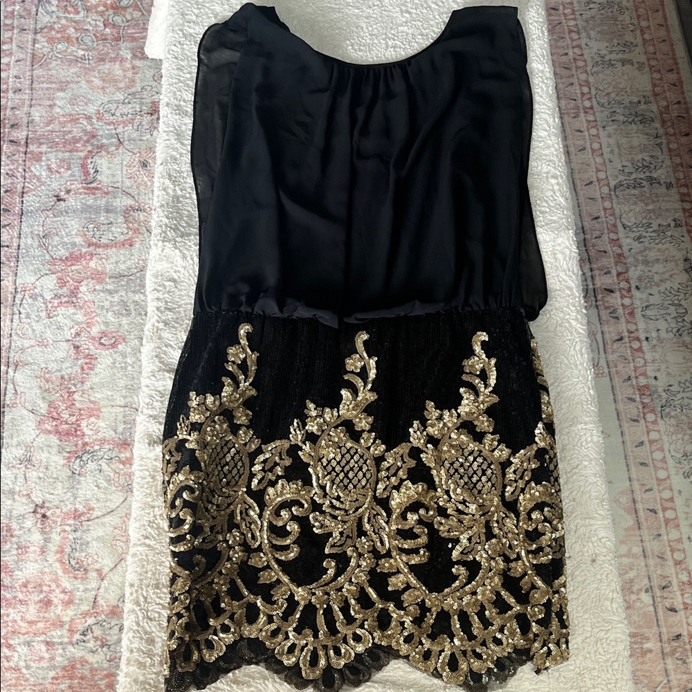 Rubber Ducky Productions, Inc. Black and Gold Lace Design